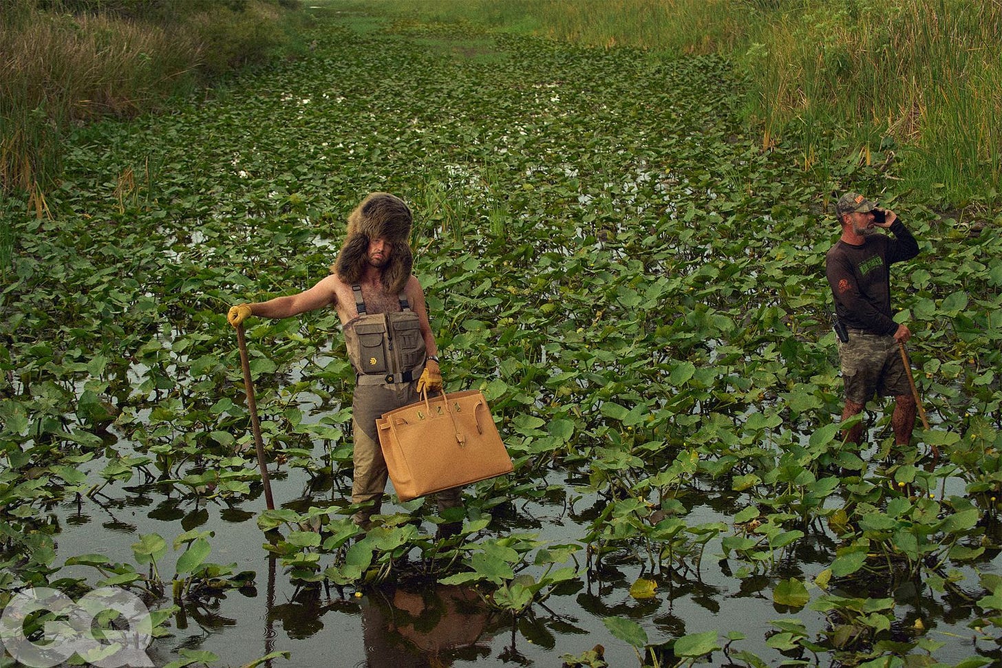 Image may contain Photography Land Nature Outdoors Pond Water Plant Vegetation Accessories Bag Handbag and Face