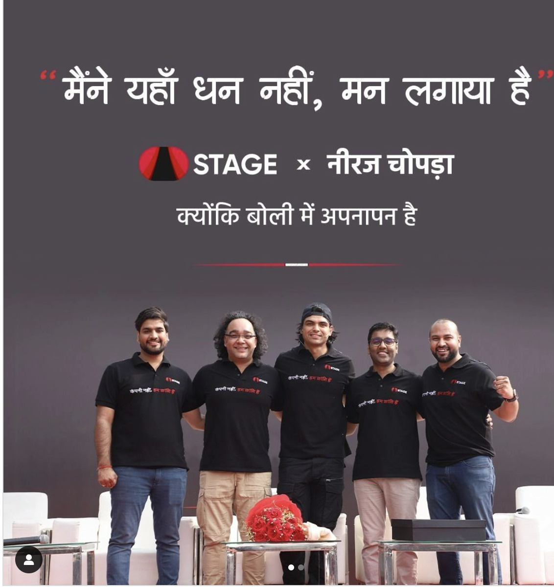 A group of men standing in front of a sign

Description automatically generated