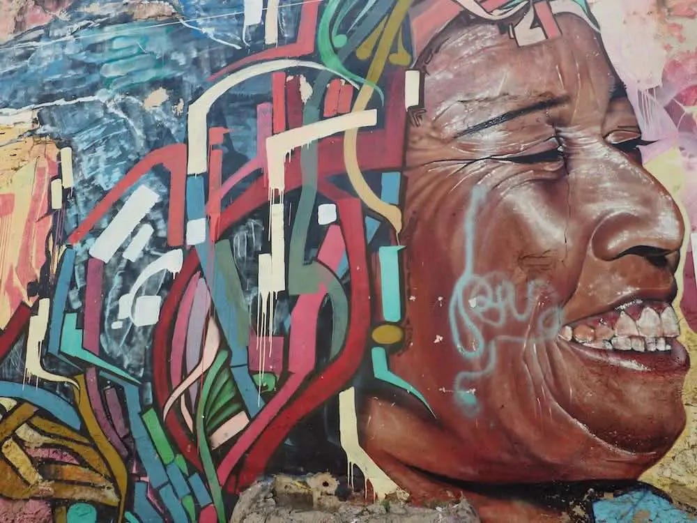 Getsemani street art - laughing woman Getsemani street art - laughing woman