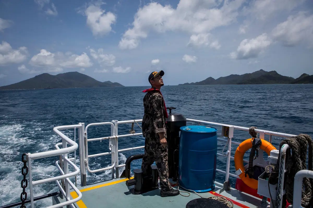 A security ship crew of the Ministry of Maritime Affairs and Fisheries prepares to anchor in Natuna during a security patrol along Indonesia's exclusive economic zone (EEZ) on Aug. 16, 2016. (Ulet Ifansasti/Getty Images) A security ship crew of the Ministry of Maritime Affairs and Fisheries prepares to anchor in Natuna during a security patrol along Indonesia's exclusive economic zone (EEZ) on Aug. 16, 2016. (Ulet Ifansasti/Getty Images)
