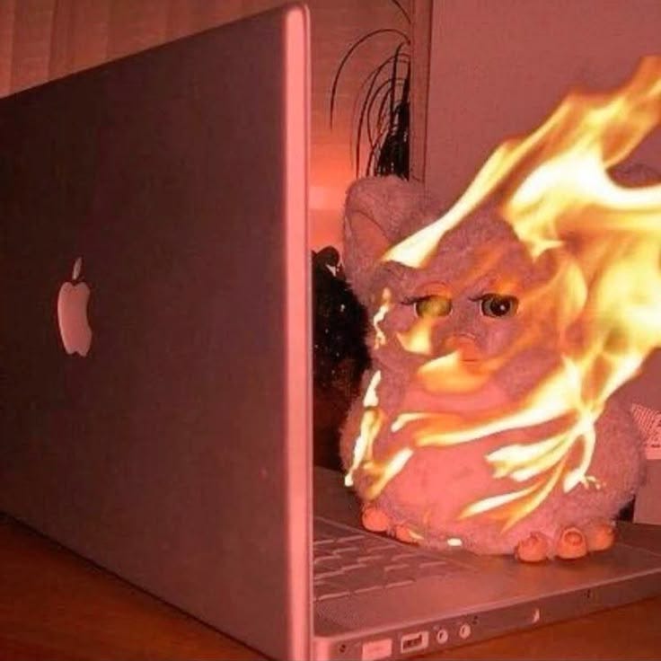Furby doll on fire