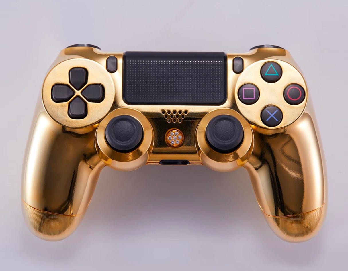 This gold encrusted PS4 controller costs about $13,000. (Image: Brikk)