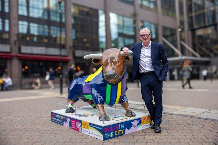 Mayor Richard Parker with one of the sculptures 