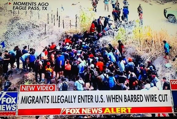 Screenshot of Sept. 25, 2023, Fox News report of migrants rushing into Eagle Pass, Texas after barbed wire barriers were cut.
