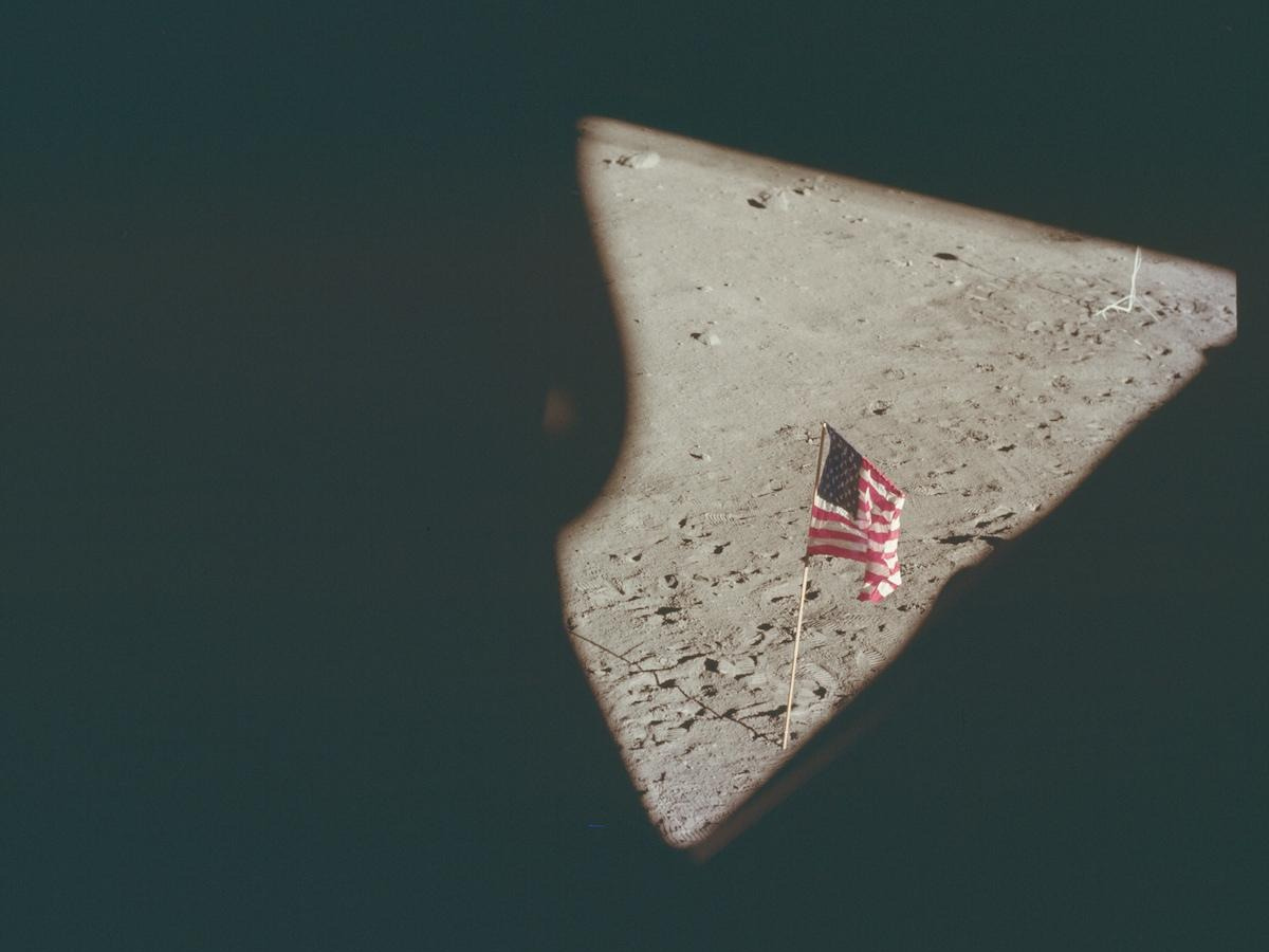 View of the american flag on the moon as viewed from a moon lander