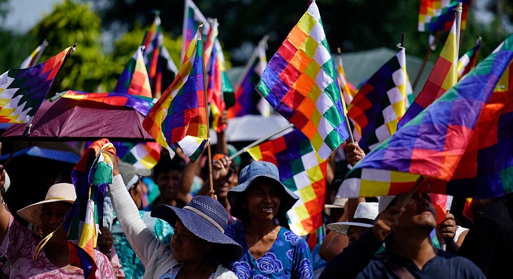 Indigenous women wave Wiphala flags during the celebrations marking the Day of the Plurinational State, in the town of Lauca Ene, Shinaota, Bolivia, on January 23, 2026. Indigenous women wave Wiphala flags during the celebrations marking the Day of the Plurinational State, in the town of Lauca Ene, Shinaota, Bolivia, on January 23, 2026.