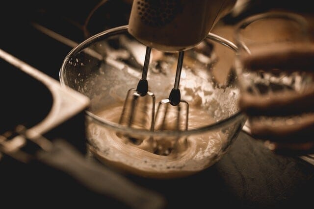 electric mixer churning batter