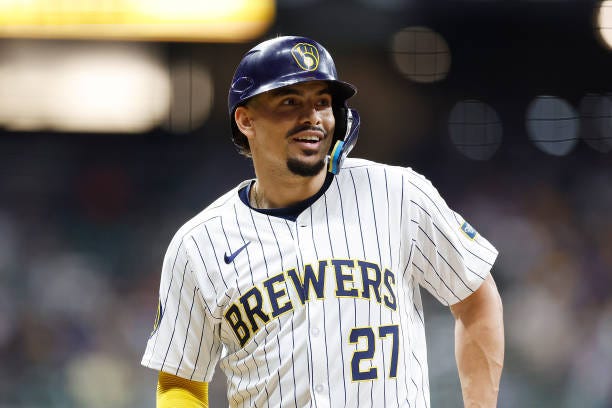Willy Adames of the Milwaukee Brewers reacts after hitting a run scoring single in the eighth inning against the New York Mets at American Family...