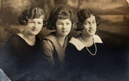 A group of women posing for a photo

AI-generated content may be incorrect.