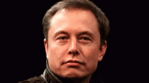 a close up of a man 's face with a serious look on his face