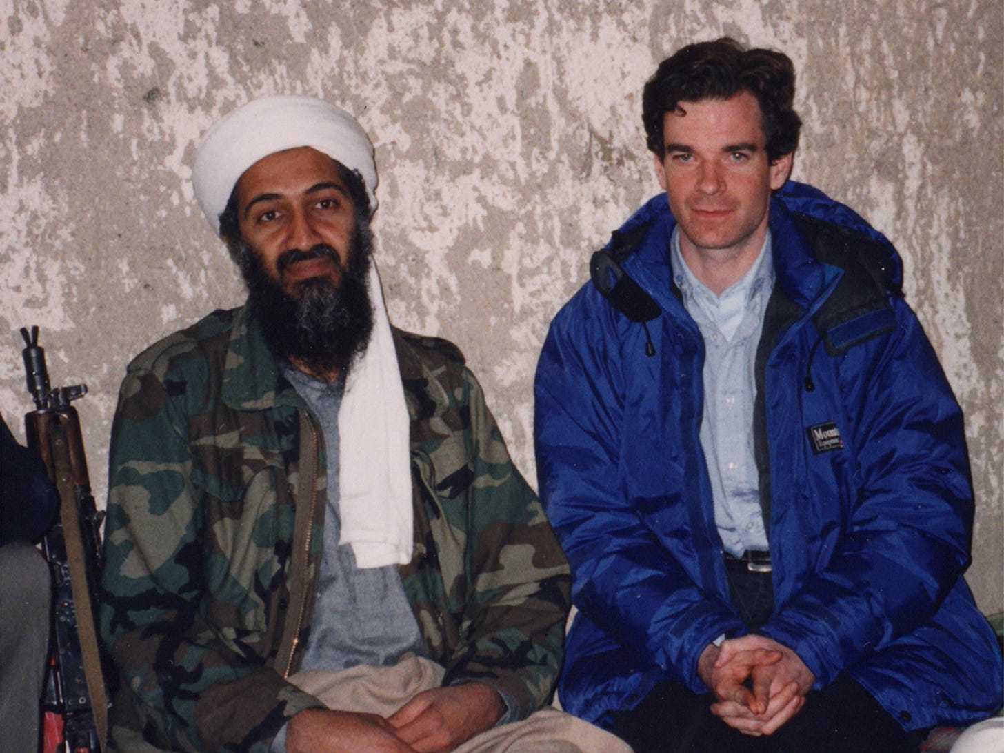 American journalist Peter Bergen conducting the first televised interview with Al-Qaeda leader Osama Bin Laden in 1997, a rare and chilling encounter with the notorious figure.