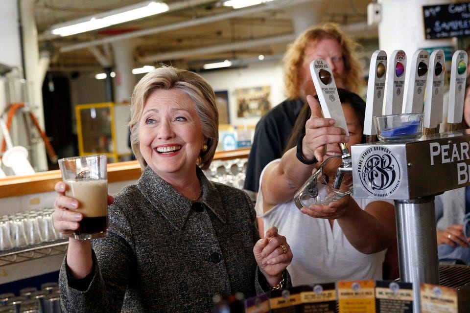 Former New York Senator Hillary Clinton failing to pour a Guiness