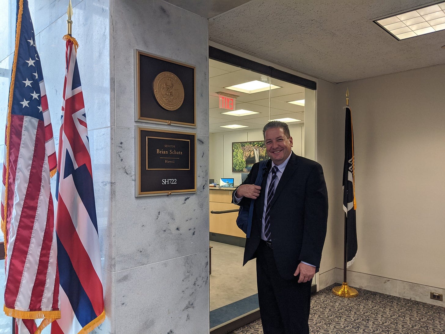 Luke Flynn, Hawai’i Space Grant Director extraordinaire, posing in front of Brian Schatz’s office at my request