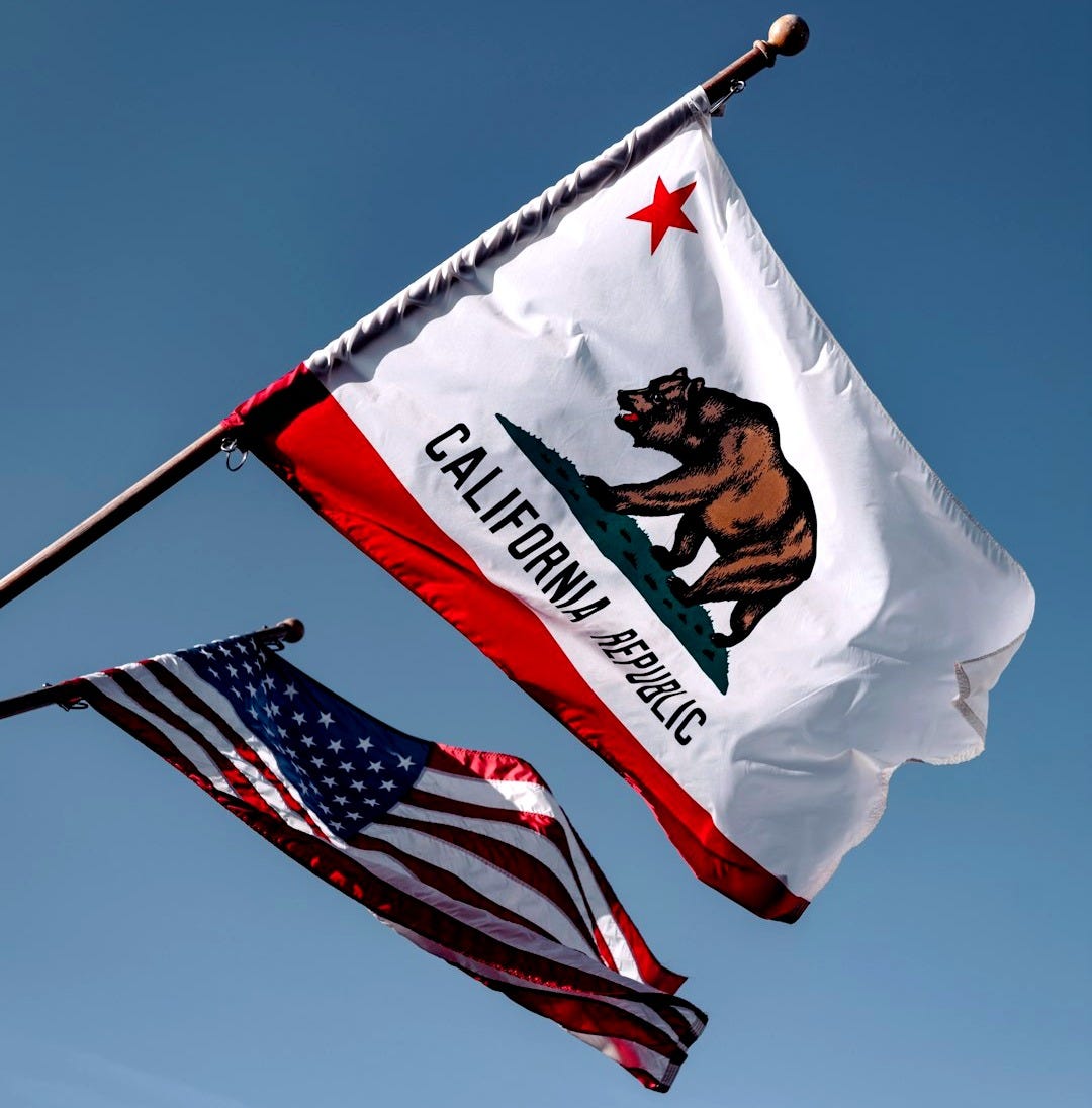 us a flag under blue sky during daytime