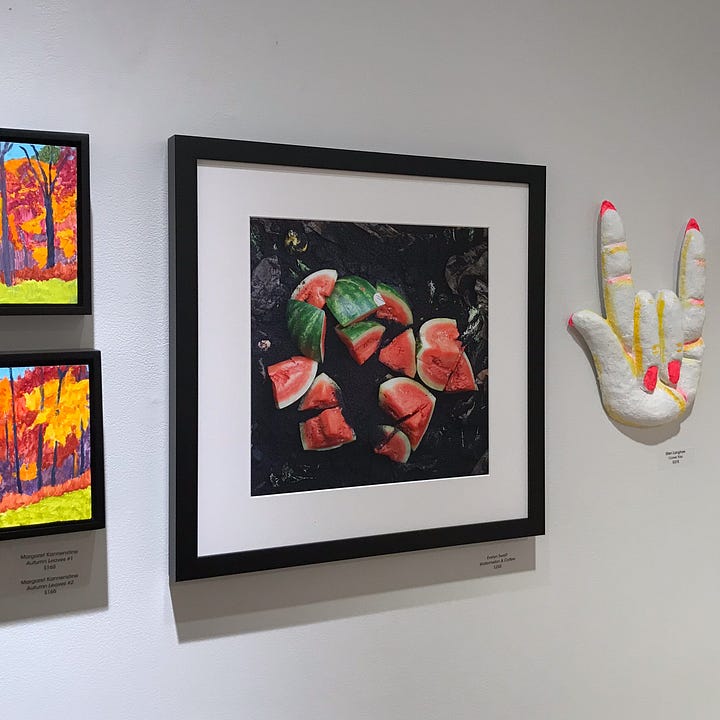 Diptych: Raspberries on white frosting; Photograph of watermelon framed on a wall