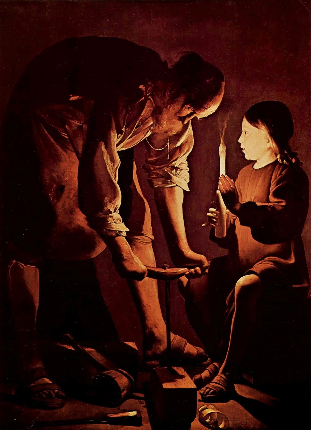 A boy holding a candle for Joseph at his workbench A boy holding a candle for Joseph at his workbench