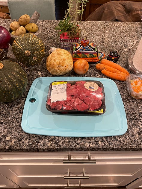 images of 1) the gathered ingredients, 2) the floured meat in a big pot, 3) the added mirepoix, 4) the added herbs and broth, 5) the added vegetables, 6) the completed bowl of stew in a blue ceramic bowl
