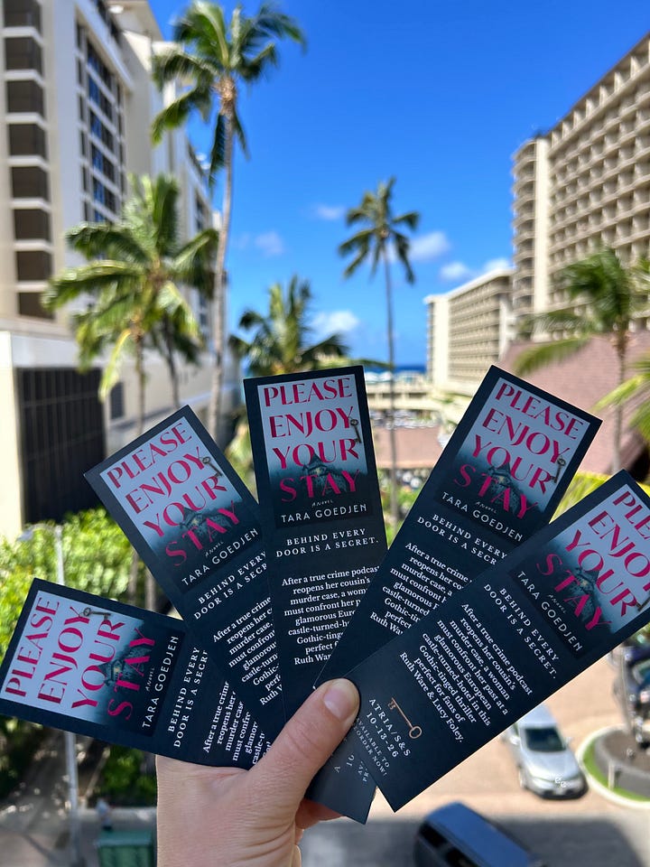Please Enjoy Your Stay bookmarks, an empty free library, BookEnds, and a view of the ocean