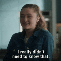 Woman making a face and saying "I really didn't need to know that."