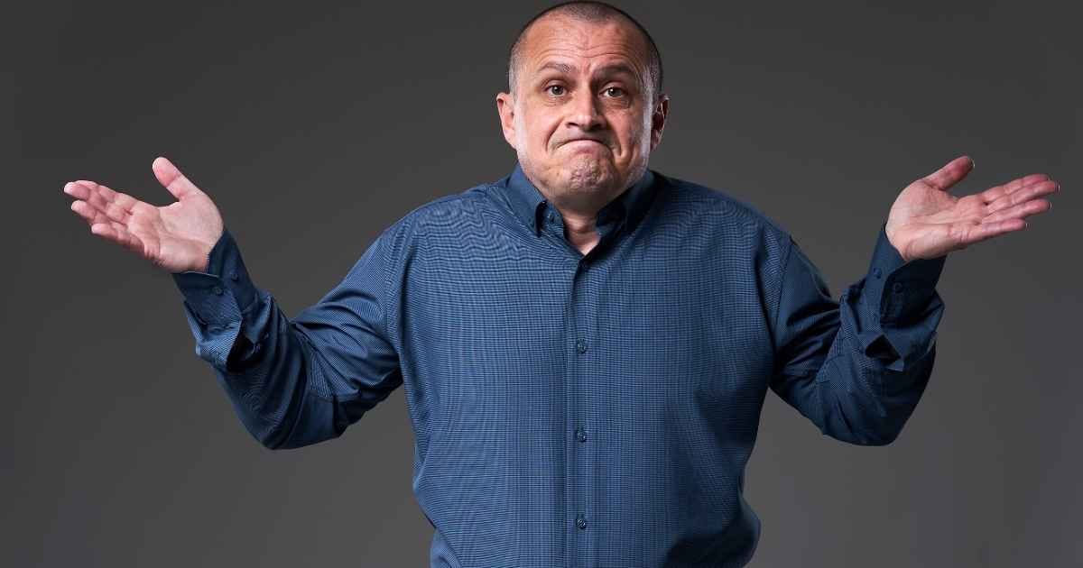 Powerless man with an I can't do anything expression on his face Powerless man with an I can't do anything expression on his face