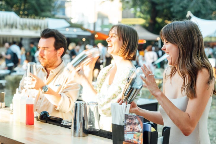 Things to do in London this weekend: three people shaking cocktails at a bar Things to do in London this weekend: three people shaking cocktails at a bar