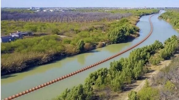 Texas was the first to install a floating barrier in the Rio Grande as part of “Operation Lone Star” (Photo from the Office of Texas Governor Greg Abbott) Texas was the first to install a floating barrier in the Rio Grande as part of “Operation Lone Star” (Photo from the Office of Texas Governor Greg Abbott)