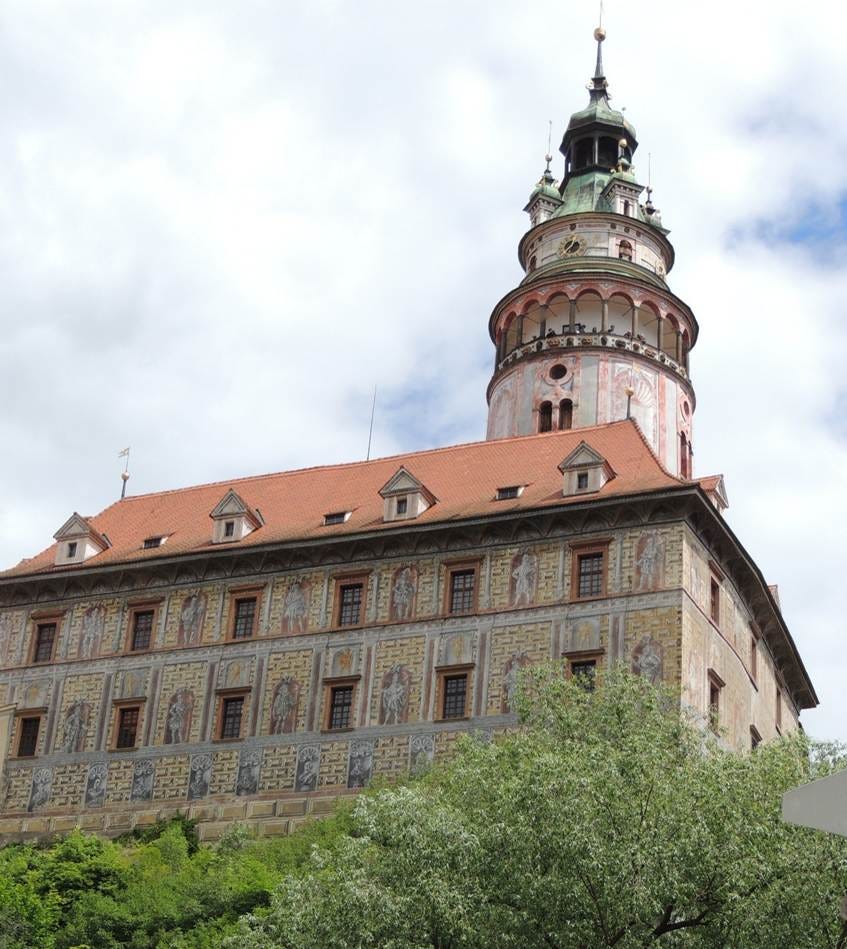 A building with a tower

AI-generated content may be incorrect.