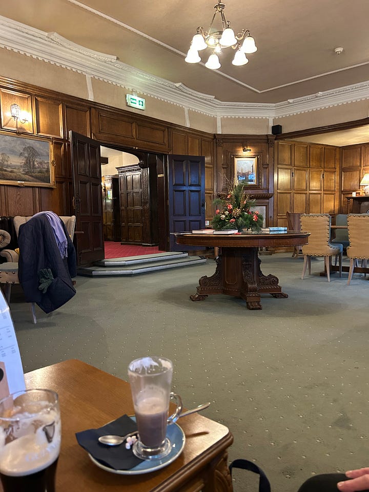 Four images of the grand hand-carved oak staircase at Petwood Hotel, Woodhall Spa. 