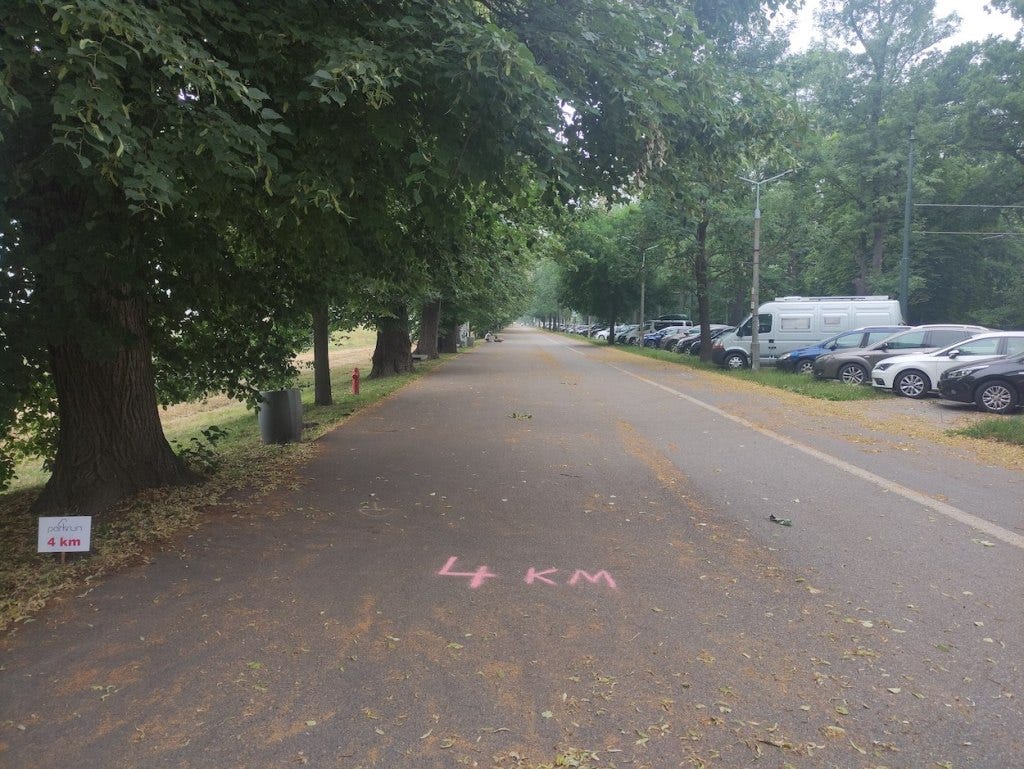 4km chalked on the ground on the long straight