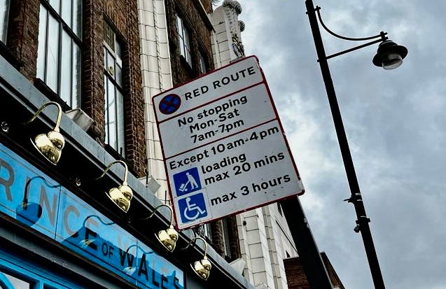 Photo of a red route sign