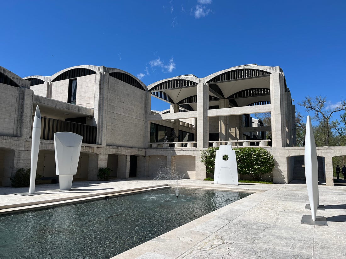 The modern exterior of The Kreeger, with a fountain in the foreground