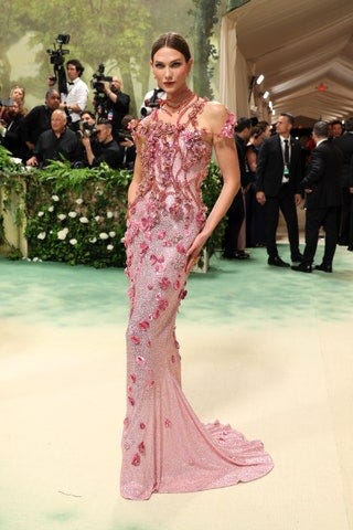 Image may contain Karlie Kloss Fashion Clothing Dress Formal Wear Footwear Shoe Adult Person and Wedding