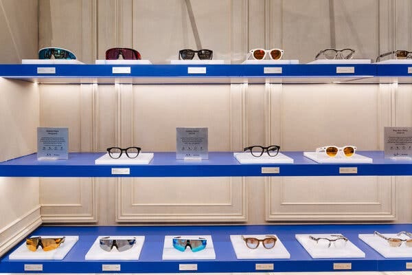 A display of various glasses on three shelves. A display of various glasses on three shelves.