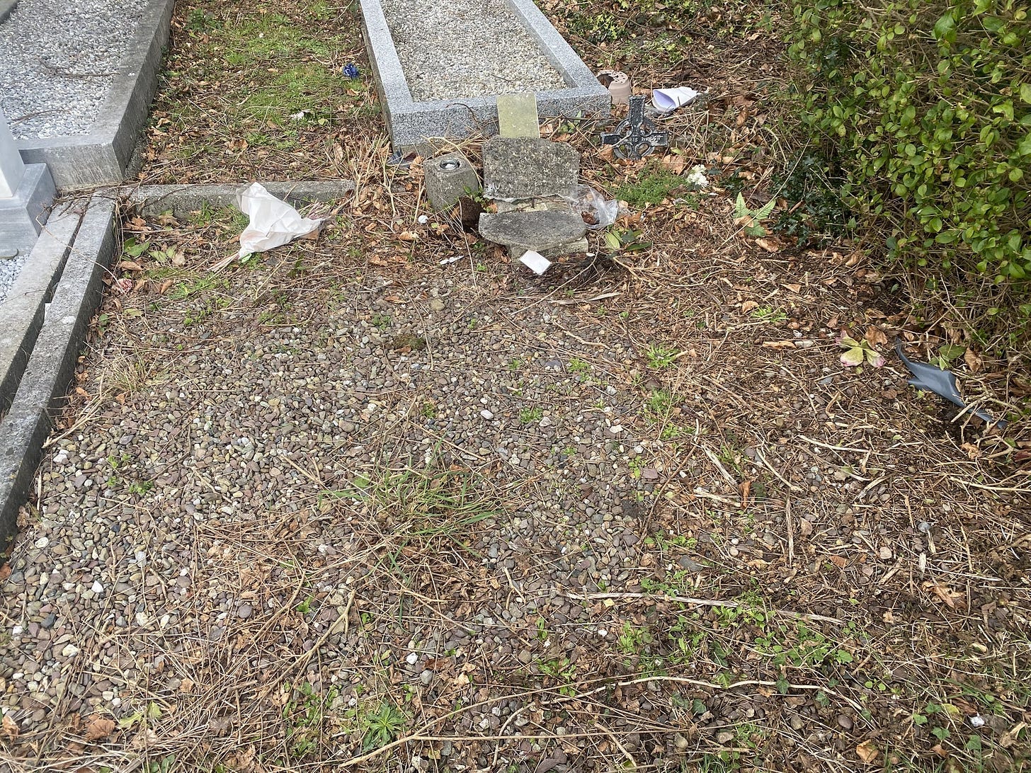 A poorly kept grave plot.