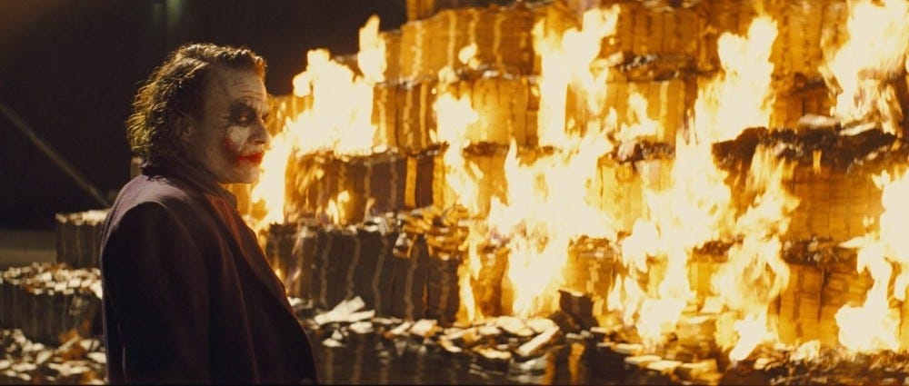 The joker burning money