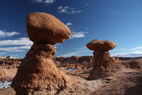 Images of barren landscapes and sky which is mainly blue