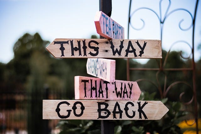 signs this way that way go back