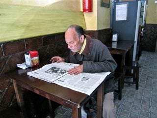 A - Jerez, man reading paper A - Jerez, man reading paper