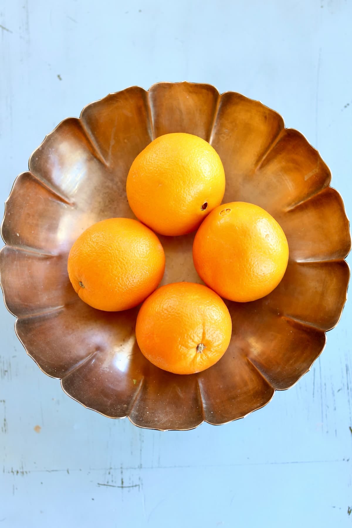 a bowl of oranges. 