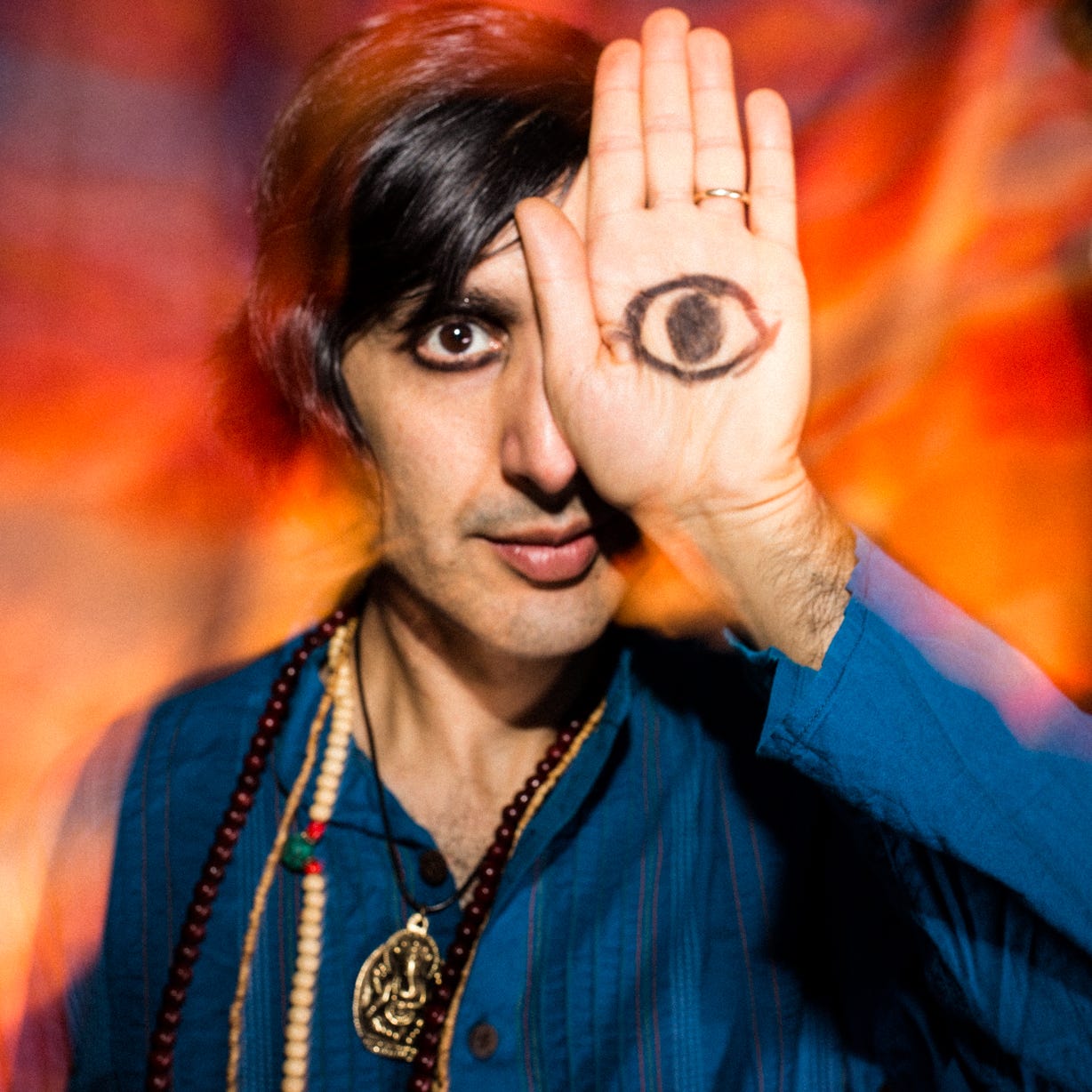 Rishi's Sacred Sounds logo