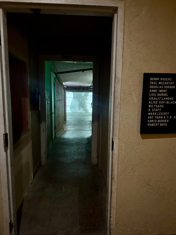 Interior and exterior shots of the Variety Arts Theater in Downtown Los Angeles featuring over 100 audio visual works from over a century around the world