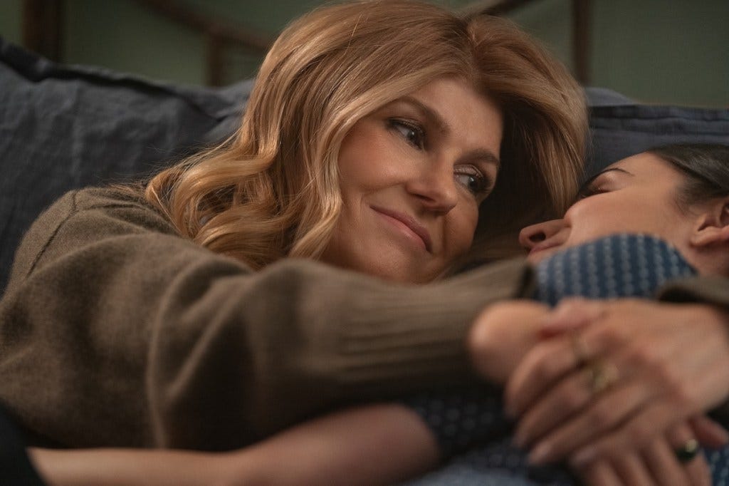 Sofia Carson & Connie Britton cuddle in "The Life List"