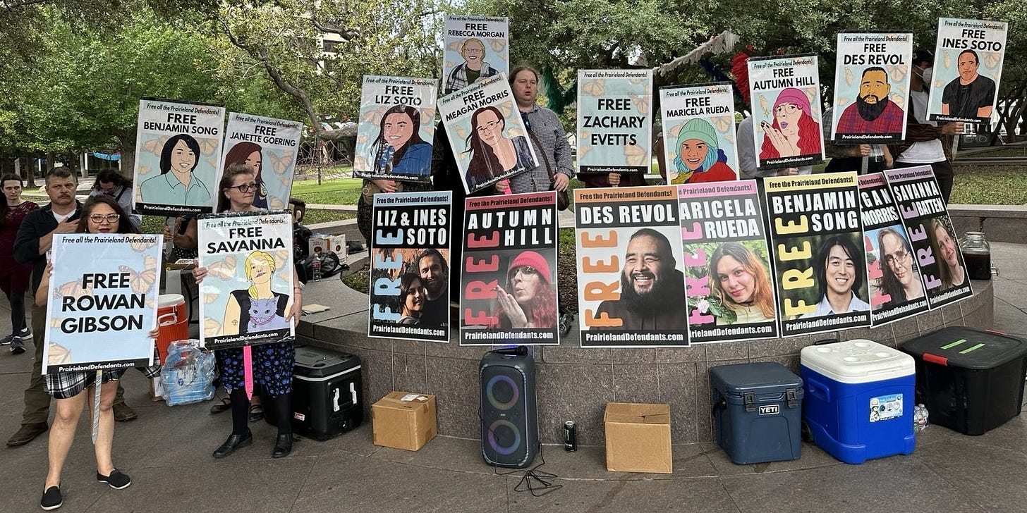 Supporters of the Prairieland defendants displayed signs outside the courthouse during sentencing on June 23, 2026 in Fort Worth, Texas.