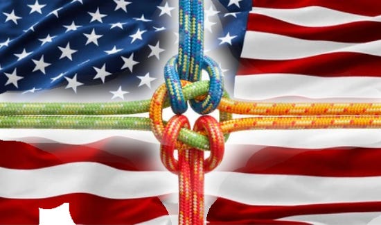Four different colored ropes coming from the sides and tied at the center into a knot, before an American flag.