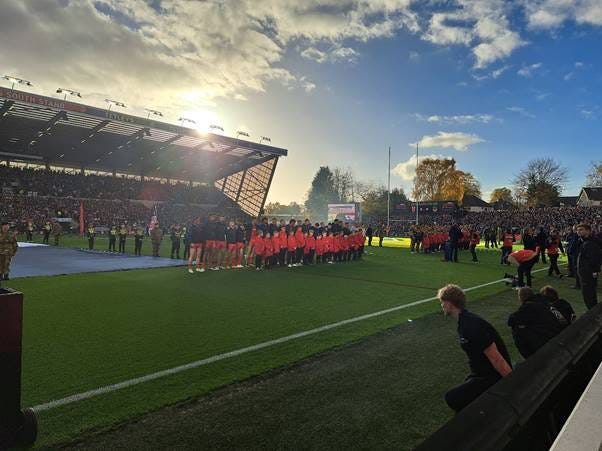 A group of people on a field

AI-generated content may be incorrect.