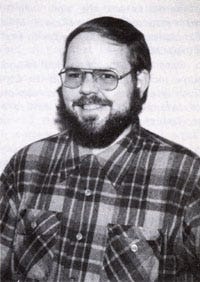 A young Dave Arenson smiling.
