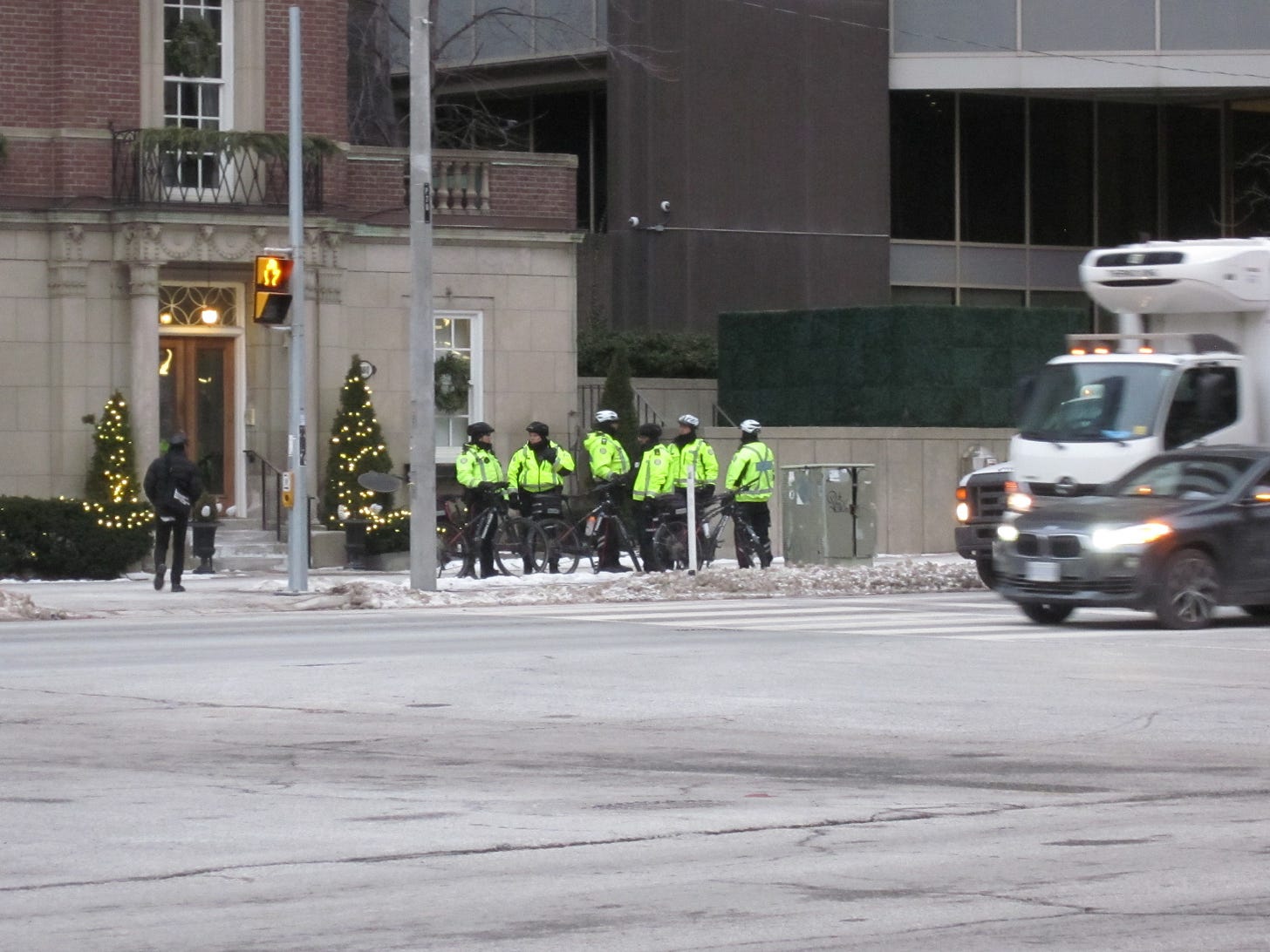 Policemen, otherwise known as state thugs or class traitors, were present at the three other corners of the street intersection. Policemen, otherwise known as state thugs or class traitors, were present at the three other corners of the street intersection.