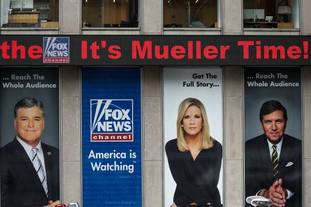 The news ticker at Fox News headquarters scrolls headlines before Special Counsel Robert Mueller makes a statement about the Russia investigation,...