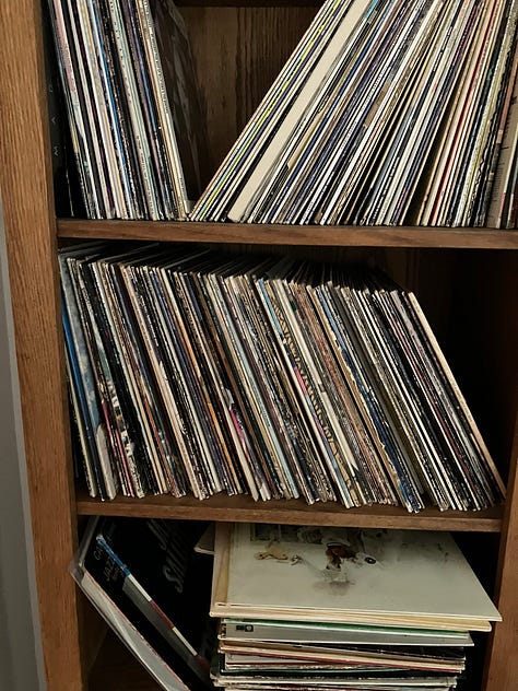 Music albums and CDs, stereo and boombox, and Simon and Garfunkel, the Who, Fleetwood Mac, and BB King