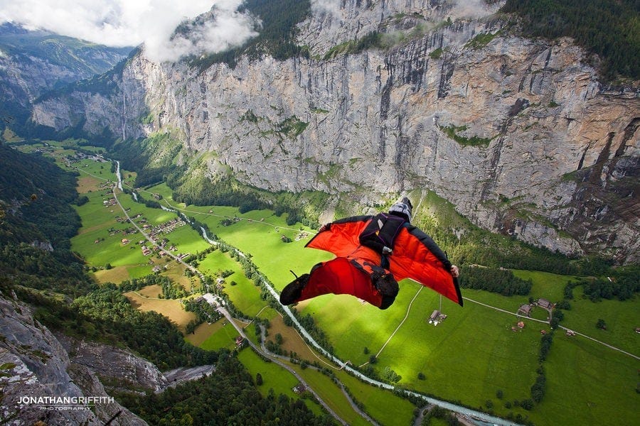 UKC Photos - Jamie Flynn wingsuit flying in the Lauterbrunnen Valley,  Switzerland.